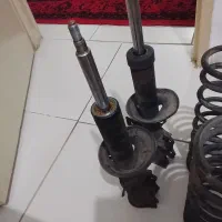 اگزوز فابریک تیبا و کمک جلو با لول فنر