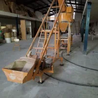 فروش یک دستگاه همزن سیمان با میز ویبره