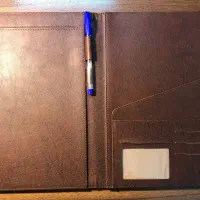 کاور اسناد چرم به همراه دفتر به همراه کلاسور کاغذ