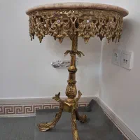 میز پایه ماهی برنز. انگور پایه برنز.ساعت دیواری