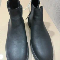 پوتین|کیف، کفش، کمربند|خوی, |دیوار