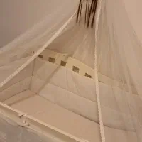 گهواره کنار مادر