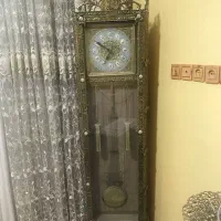 ساعت .زیر تلویزیون .اینه وکنسول