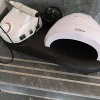 دستگاه  uv و سوهان ناخن و میز کوچک
