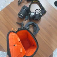 دوربین نیکون d7200 لنز ۱۸.۱۴۰باتری کیف شارژر هولدر