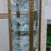 ویترین و ساعت ایستاده برنجی و برنز