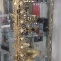 بوفه و آینه برنز در حد نو و مقداری تزیناتی .