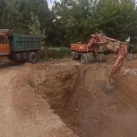 بیل مکانیکی حمل و بارگیری نخاله خاک پی
