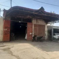 فروش-گاراژ240-متر-همراه-ساختمان-بالا
