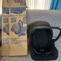 کریر و صندلی ماشین بیبی لند در حد نو