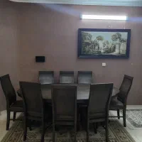میز ناهارخوری ۸ نفره چوبی قهوه‌ای تیره