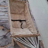 گهواره و آغوش نوزاد