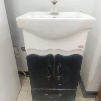 سینک ظرفشویی و یک عدد روشویی