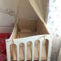 گهواره تخت کنارمادرو کریر نوهستن
