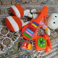 اسباب بازی عروسک و جغجغه