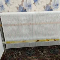 تابلو فرش نقاش جوان