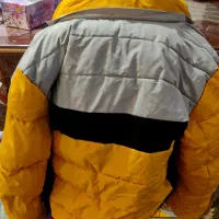 کاپشن زرد و مشکی