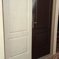 درب چوبی دو لنگه به همراه چارچوب