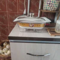 تعدادی ظروف و قالیچه و ماهیتابه لطفاً ورق بزنید