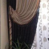 کناره پرده جفت به همراه گوشواره هاش