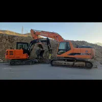 اجاره مینی بیل وبیل مکانیکی باپیکور درکل کرج وحومه