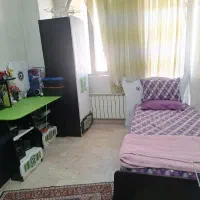 یک عدد تخت خواب نوجوان همراه با میز تحریروکمد
