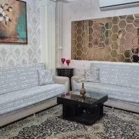 کاناپه تختخوابشو و میز جلو مبلی