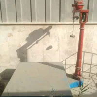 1عدد قپان یک تنی سنگ سر خود و یک عدد قپان