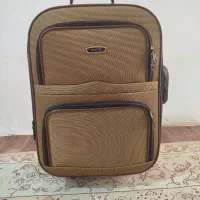 چمدان سایز کوچیک چرخدار‌ورمزدار