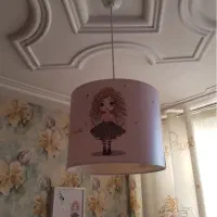 چراغ خواب و ساعت و لوستر ست اتاق کودک