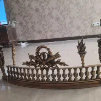 دکور جلوی شومینه برنجی کار شده