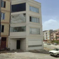 اجرای نمای ساختمان با متریال سیمان.