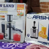 آب مرکبات گیر عرشیا و آب میوه گیری نیولند
