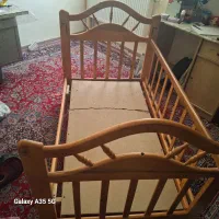 تخت خواب چوبی کودک.قابلیت گهواره دارد|تخت و صندلی بچه|کرمان, |دیوار