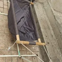گهواره سنتی یا ننو با پایه اهنی کاملا سالم