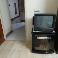 فروش تلویزیون ناسیونال ومیز تلویزیون