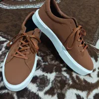 کاپشن|لباس|قره ضیاالدین, |دیوار