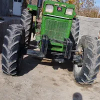 یکدسگا ه تراکتور آیتم عطیقه برابر شیش