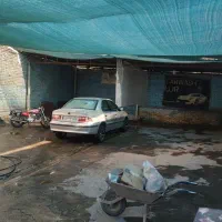 کارگر کارواش وپنچر گیری زنگ بزن