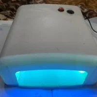دستگاه یووی وکیف لوازم مژه