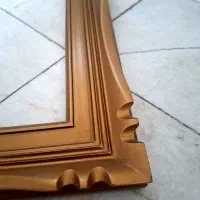 قاب چوبی طلایی