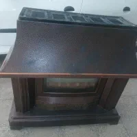 بخاری طرح شومینه|بخاری، هیتر، شومینه|مهاجران, |دیوار