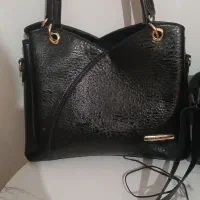 دوعددکیف مشکی درحدنوچندماهه خریداری شده ۷۰۰