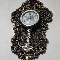 ساعت و جا دستمال و سطل زباله