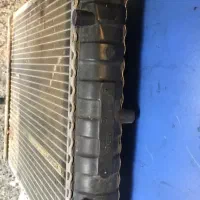 رادیاتور  دو لول پژو  و دینام پژو