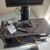 میز شیشه ای تلویزیون