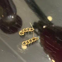 دستبند و گوشواره با دو درصد در حد نو