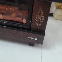 بخاری شومینه نیک کالا۲۸۰۰۰|بخاری، هیتر، شومینه|شیروان (خراسان), |دیوار