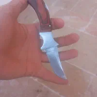چاقو ضامن داره