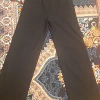 تعدادی شلوار و  لباس زنانه